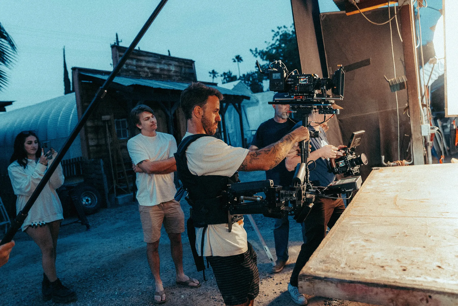 Bradley operating a gimbal with the crew in an alley