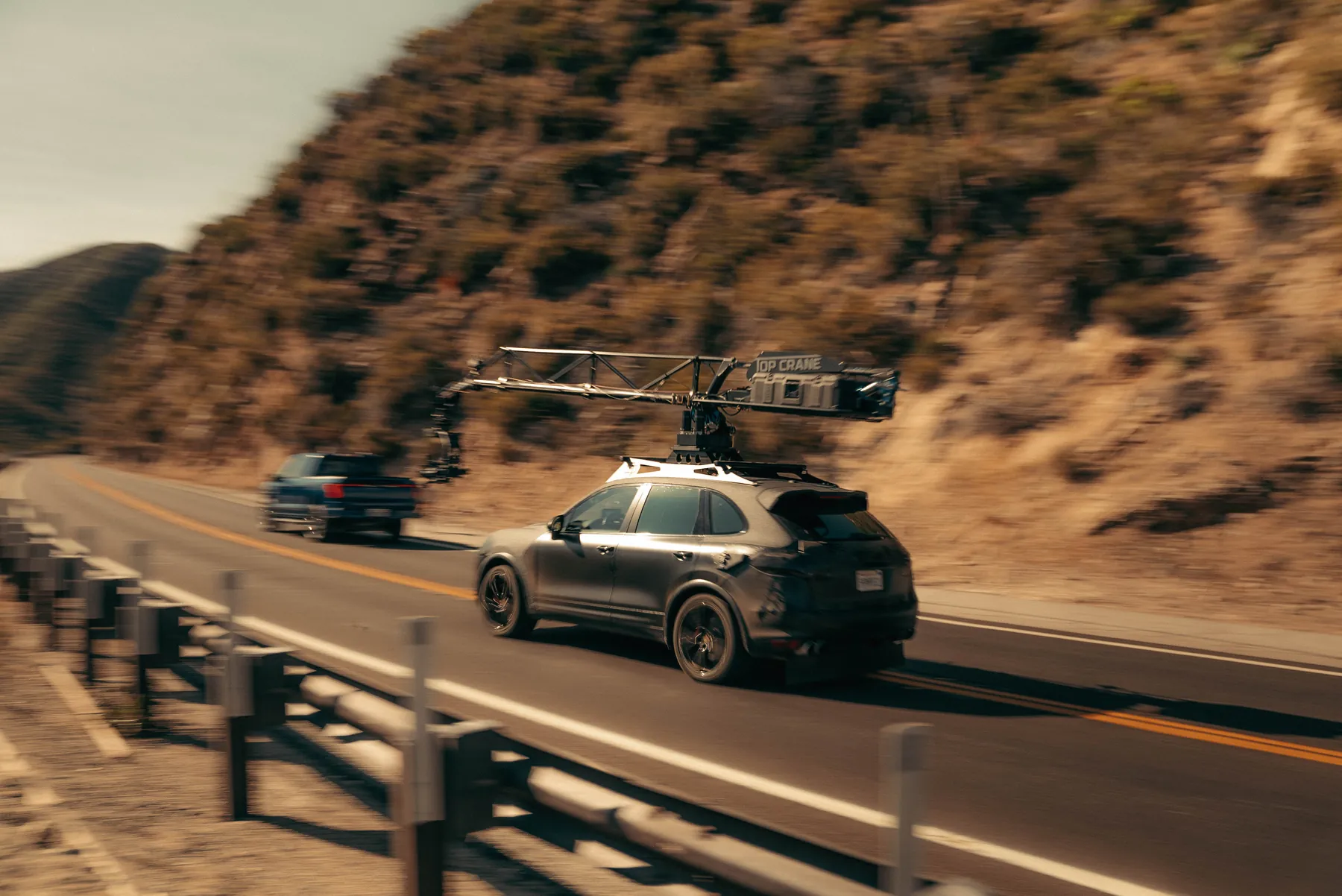 Camera car tracking a shot on a mountain highway